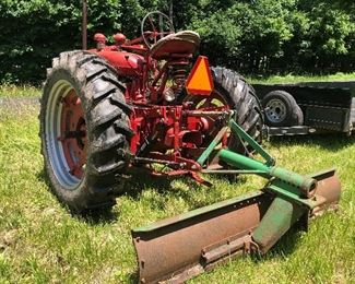 Tractor with plow 