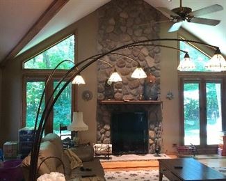 Stain glass shade overhanging large lamp (sorry,  furniture in this room is not for sale)