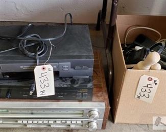 433:
Toshiba VHS Player, Paramount Pictures Sound Decoder, Toshiba Stereo Receiver and more!
More vintage audio/video equipment. A Paramount Pictures AV surround sound decoder, for the real theater experience! A Toshiba VHS Player stereo receiver, and a box of miscellaneous cords, remotes, etc. Measurements run from 9"×17"×4" to 14"×21"×6.5"