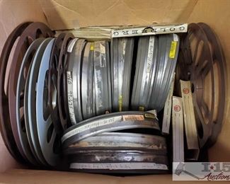 435: 7"-14" Movie Reels and Cases
Shown here are roughly a dozen or more 7"-14" Movie Reels and Cases, Goldberg 16mm reel in box for automatic projector.