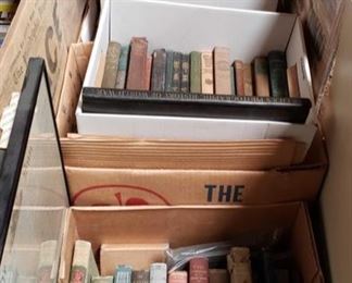 454: Vintage Books and authentic vintage newspapers
This is a box of vintage reads to get lost in!! Includes some Shakespeare titles, a book of historical illustrations, an early textbook, religious songbooks, diaries, and several stacks of authentic 19th century collectible newspapers.