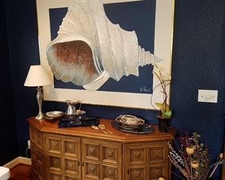 Drexel Cut-corner credenza with panel doors. Painting of shell by Lee Reynolds