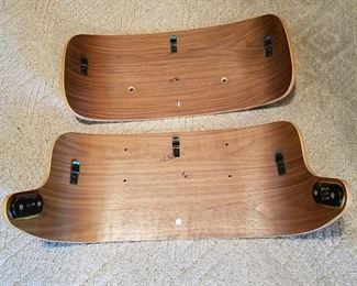 Found in a box! Dated 1998, the two back pieces to an Eames chair (missing the seat section).  Both have hand-written '1236' indicating factory matched walnut veneers.  Being sold as a two-piece set.