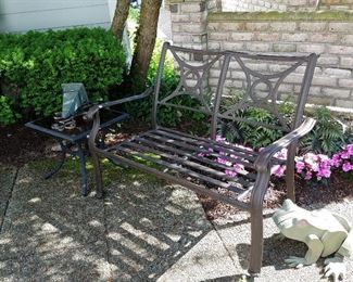 Outdoor bench and glass top side table