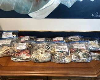 Bags full of wearable/resalable costume jewelry. Assorted Necklaces, earrings, and bracelets.