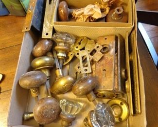 Antique glass, wooden and brass door knobs/lock sets.