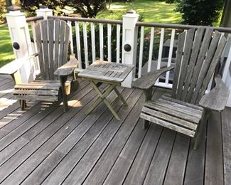 Teak Adirondack chairs with ottomans
