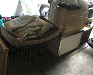 Several dog kennels/carriers