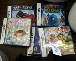 Nintendo DS Lite Portable Gaming System Including Games Qty 6, Monsters Vs Aliens, Super Mario, Garfield's Funfest And More