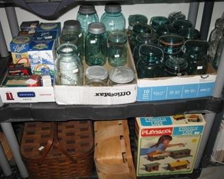 50 fruit jars that are mostly blue mason jars    Amber globe fruit jar and some lightning fruit jars and others