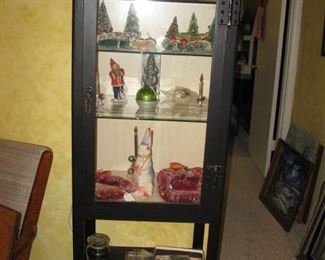 Old medical cabinet with vintage Christmas inside