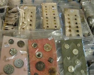 New old stock glass buttons on top                                                    Below vintage buttons on cards