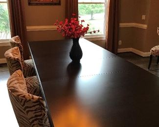 Large Contemporary Dining Table with 2 leaves and protective table pads.