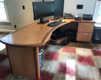 Custom desk with 2 built in file cabinets, pen drawer, and a raised nook to store desktop and accessories. 