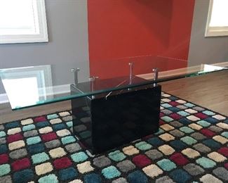 Coffee table with glass top and marble base.  Matching side table is also available.