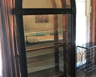 Curio cabinet with decorative boarder and case lighting.  Glass side easily open for easy access to display sentimental items, knickknacks, photos, etc.