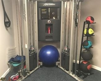 Life Fitness Pulley Weight Machine, excellent condition, lots of accessories.