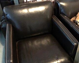 Leather Chairs with matching ottoman. 