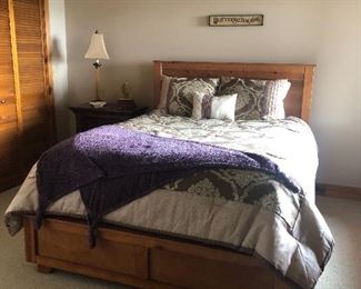 Queen bed with like new pillow top bedding