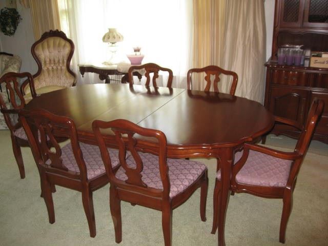 Cherry dining table with 3 leaves, pads, 8 chairs