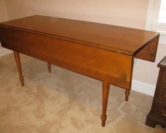 Maple table with stencilled drop sides