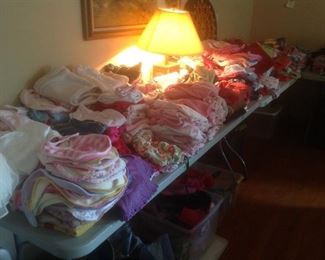 Tables of children's clothes from newborn to 12.  Some brand new clothes....have tags