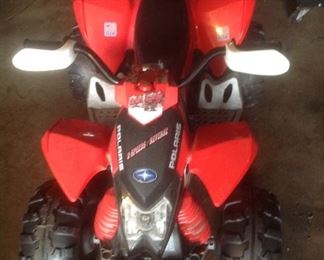 Motorized Polaris MXR 450 vehicle....2 forward speeds and reverse.  Includes charger.  Presale...$75