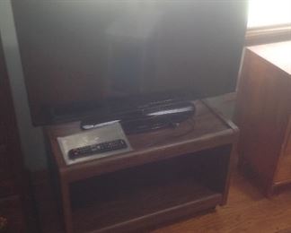Samsung 40" flat screen tv and stand ...presale $150