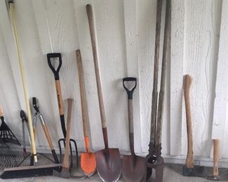 More yard tools: shovels, post hole digger, pitchfork, axes