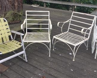 Vintage patio furniture (chairs) - webbed chair on the left is a rocker.