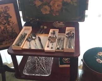 2 tier mahogany end table, green wood tole tray, misc. silverplate flatware