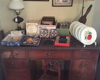 Vintage mahogany desk, painted child's chair, decorative tiles, samplers, milk glass plates with fruit designs