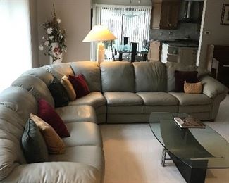 TAUPE GREENISH NATUZZI LEATHER SECTIONAL
116” LENGTH x 120” WIDTH x 31” HEIGHT x 39” DEPTH