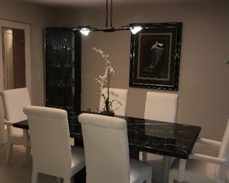 FORMAL DINING ROOM 
BLACK & WHITE ITALIAN MARBLE TABLE WITH 6 UPHOLSTERED CREAM CHAIRS 
78.5” LENGTH x 39”WIDTH x 28.5” HEIGHT 