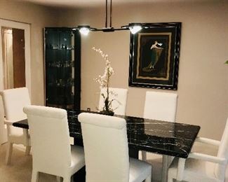 FORMAL DINING ROOM 
BLACK & WHITE ITALIAN MARBLE TABLE WITH 6 UPHOLSTERED CREAM CHAIRS 
78.5” LENGTH x 39”WIDTH x 28.5” HEIGHT 