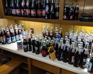 Soft Drink collectors bottles, Cowboys, Texas, Oklahoma, Pittsburg and a ton more