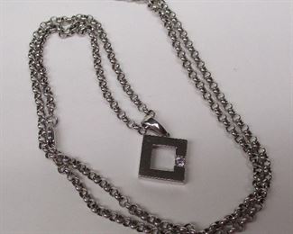 14k white gold modern pendant with diamond