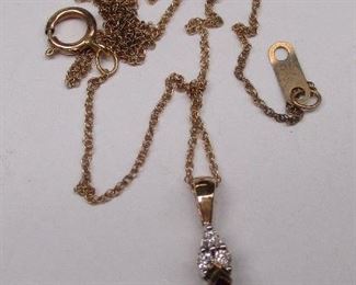 gold garnet pendant with diamonds