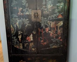 Antique Chinese Cabinet in excellent condition.  It is hand painted and the interior of the upper section is fitted with shelves.  There is a single bottom drawer below