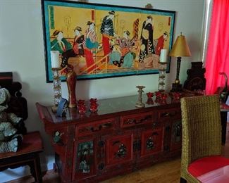 Oriental Cabinet or Buffet and Japanese style Wall Screen.  The front and sides of the buffet or cabinet are decorated with scenes and there is a protective glass top. The 3-panel Wall screen is  actually an interpretive painting by Myrna Nein depicting a scene from Japanese life.