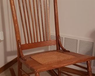 Antique oak rocker with cane seat