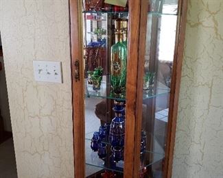 Lighted curio cabinet with Czech glass