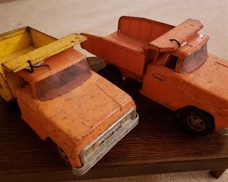 Two vintage Tonka dump trucks