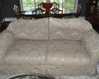 Beige Quatrine slip cover sofa, 6'9" w x 30"h x 40"d