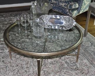 Antiqued painted silver wood and glass coffee table, 31"round, x 19"h, shown with a gorgeous 5" Baccarat Ice Bucket, wine goblets, Susan Stocking aluminum tray and a large mid century swirl glass vase!!