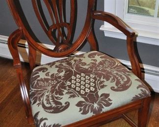 Newly upholstered mahogany shield back arm chair included with 5 armless chairs dining chairs