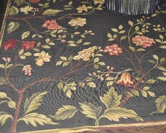 Spectacular dark brown base with cream, red and green floral design needlepoint area rug, 8' x 9'10'