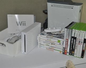 Wii console, many remotes to select, Wii games as well as Xbox 360 and games
