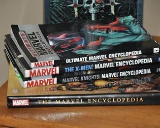 Collection of Marvel comic books and hardcover bookstore
