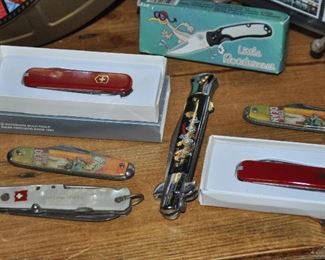 Assortment of folding knives including Swiss Army, mother of pearl, and Eddie Dean